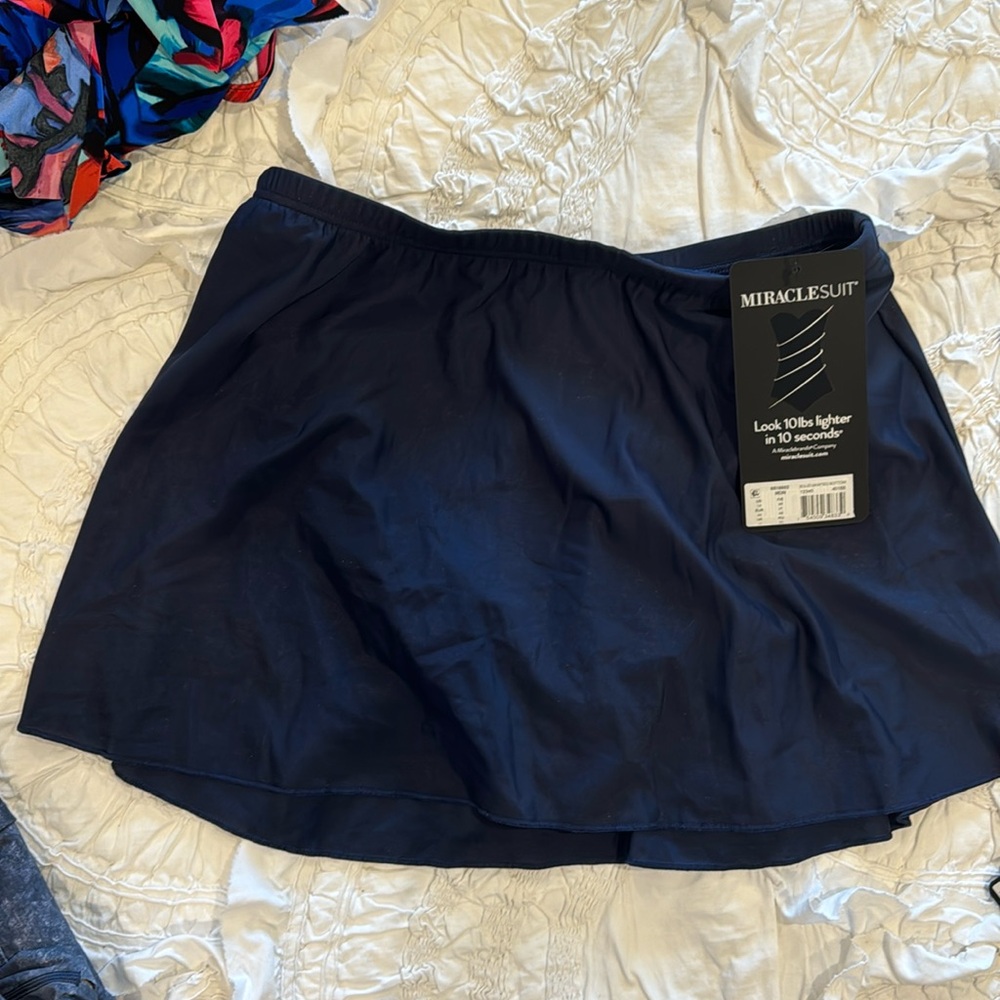 NWT miracle suit, swim skirt, size 14, navy blue